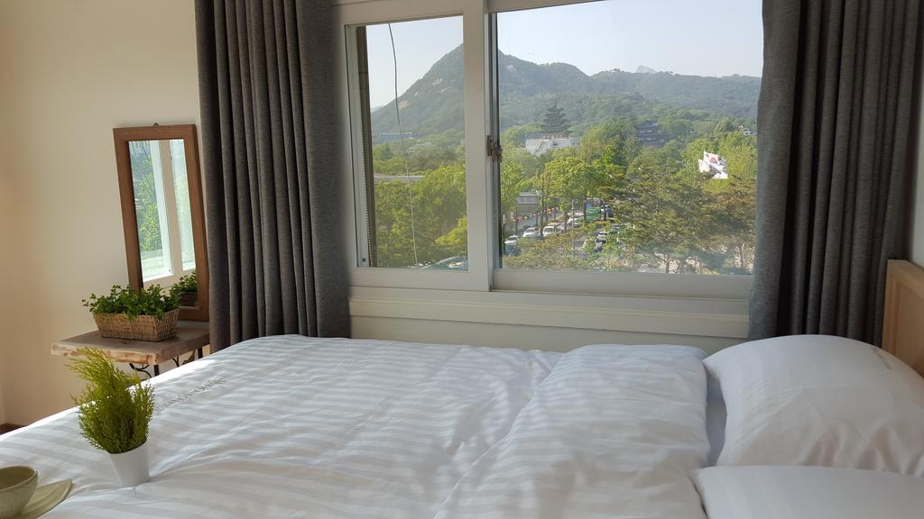 Woo Guest House Seoul Værelse billede