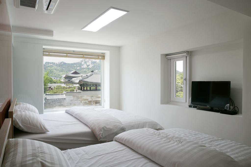 Woo Guest House Seoul Værelse billede