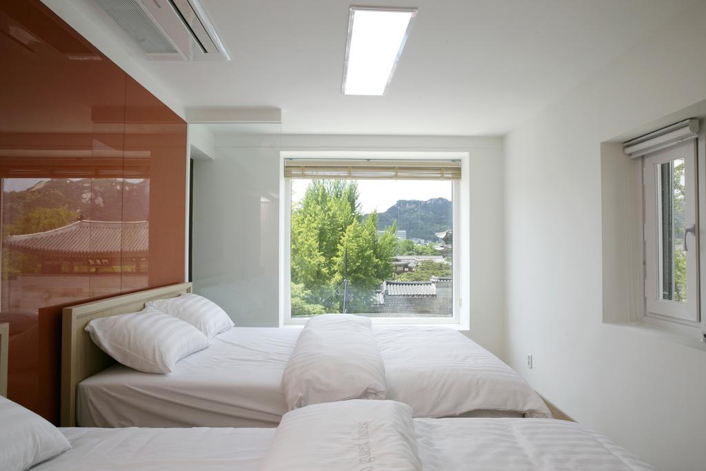 Woo Guest House Seoul Værelse billede